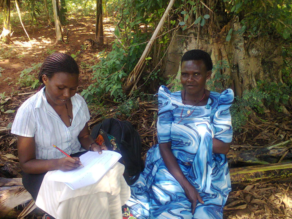 Paula administering a questionnaire to one of the players in cassava industry in Nakasongola, Uganda