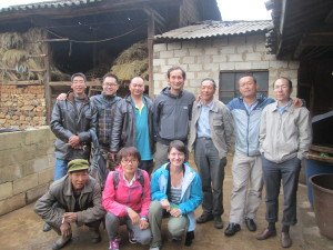 Junghong Qin, Willy Pradel, and Stephanie Myrick with locals from the village and the enumerators after piloting the surveys