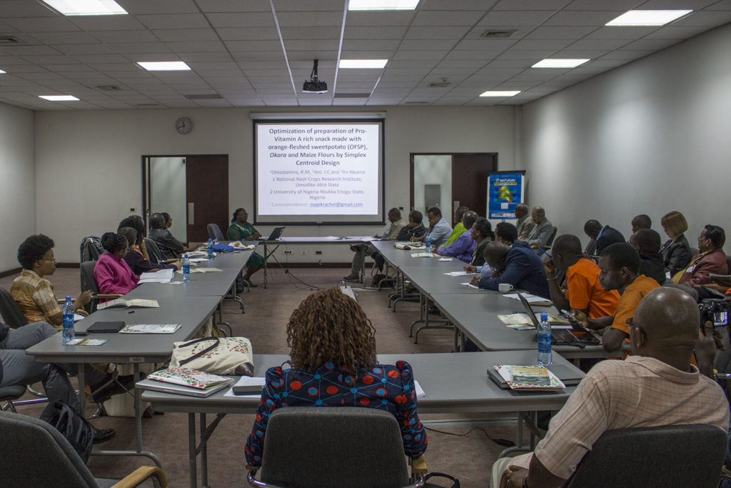 Rachel (center front) presents her findings during the APA conference